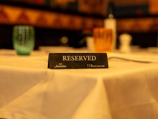 reserved sign on elegant restaurant table