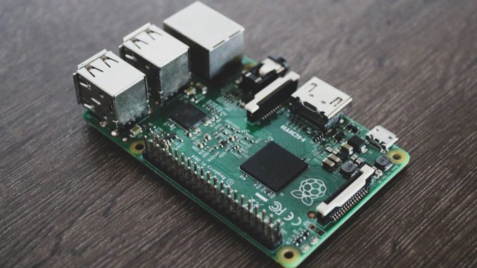 silver and green circuit board